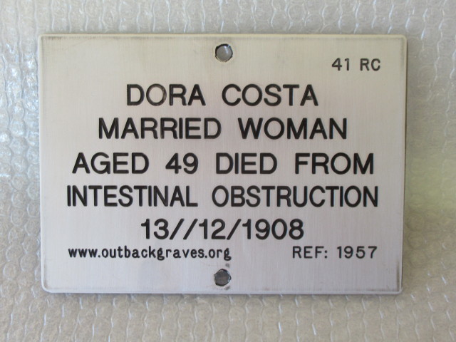 This is a photograph of plaque number 1957 for DORA COSTA of KOOKYNIE