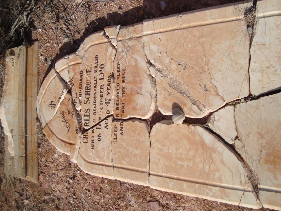 This is a photo of a broken headstone at Burtville